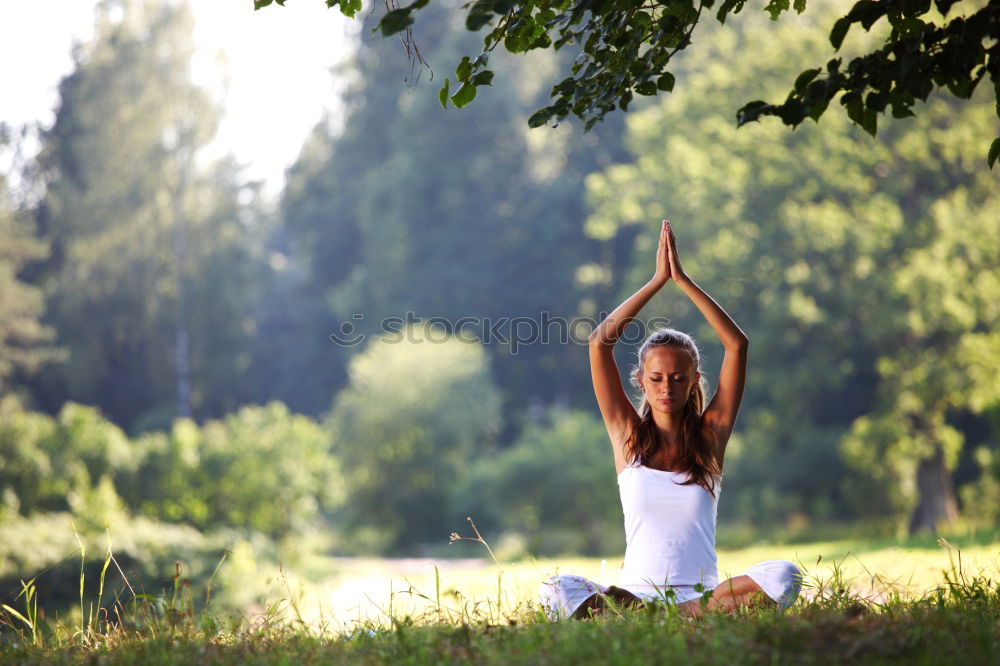 Similar – Image, Stock Photo Mother and daughter doing yoga exercises on grass in the park at the day time