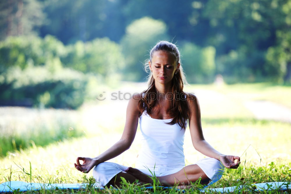 Similar – Image, Stock Photo Young woman doing yoga in nature