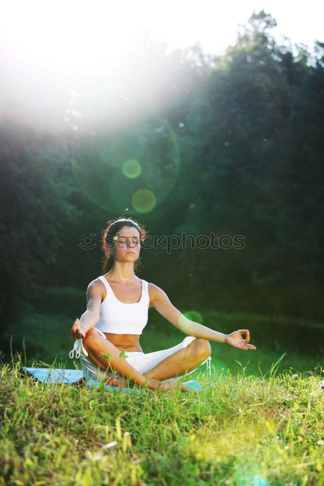 Similar – Woman Meditating And Practicing Yoga, Padmasana.