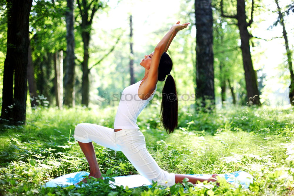 Similar – Image, Stock Photo Young woman doing yoga in nature.