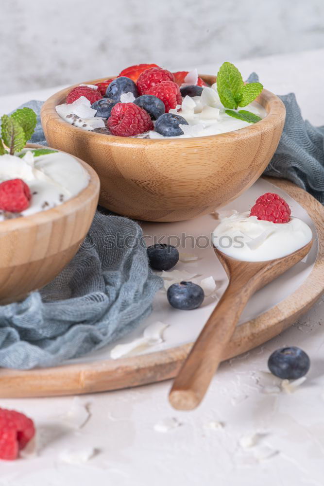 Similar – Oat flakes with milk and berries