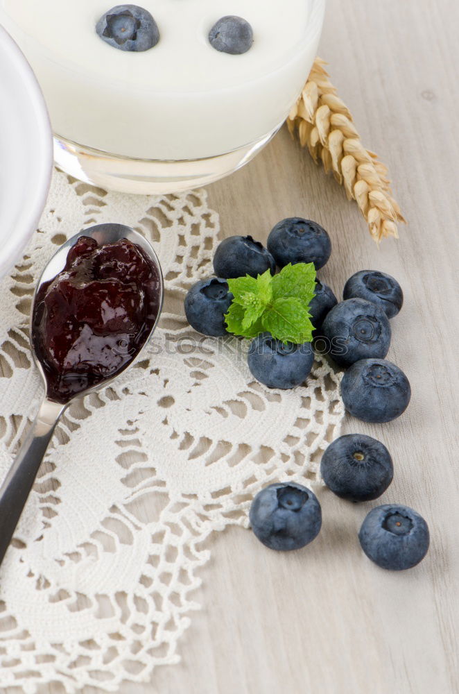 Similar – Image, Stock Photo Woman’s hands in sweater holding wooden bowl with grapes