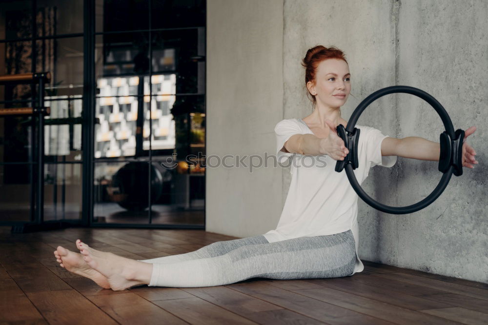 Similar – Image, Stock Photo Woman using fascial roller