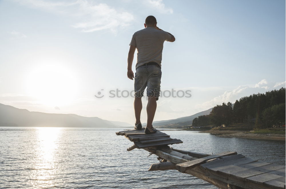 Image, Stock Photo Young adult in front of mountain dam