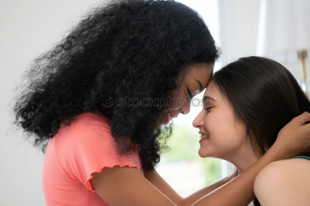 Female couple standing together