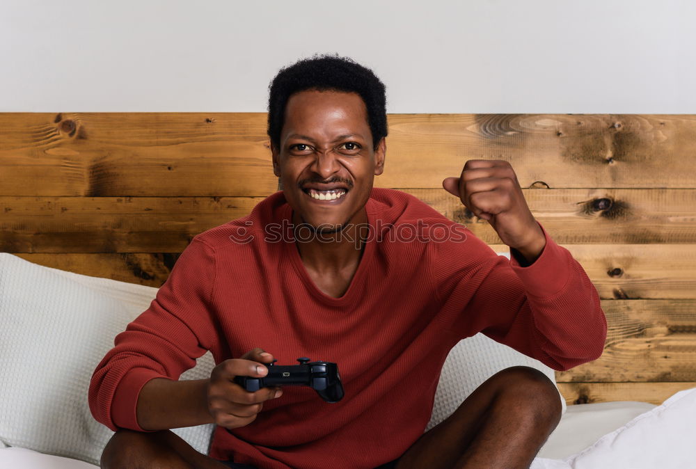 Similar – Image, Stock Photo Man having fun playing games