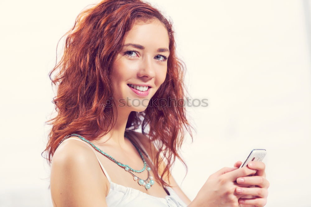 Similar – Image, Stock Photo Fashionable woman holding her mobile