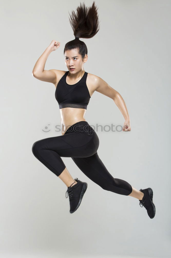 Similar – Young woman doing stretching exercises