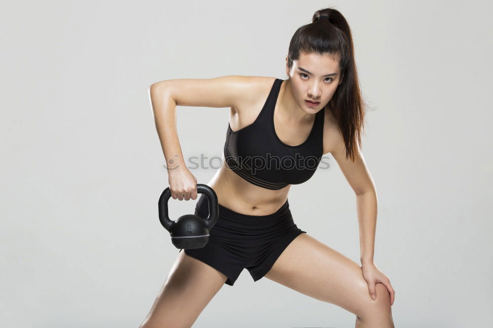 Similar – Young woman doing stretching exercises