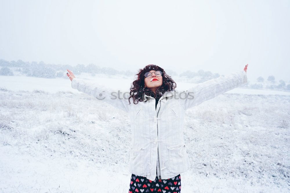 Similar – Image, Stock Photo Young woman enjoying a snowy winter