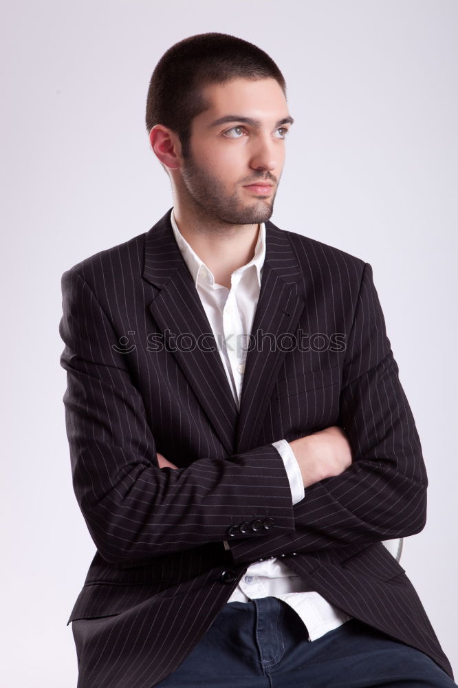 Similar – Image, Stock Photo Young stylish man at white wall