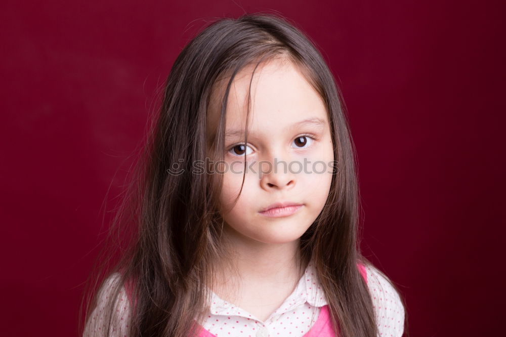 Similar – Image, Stock Photo Young woman with a cross covering her mouth