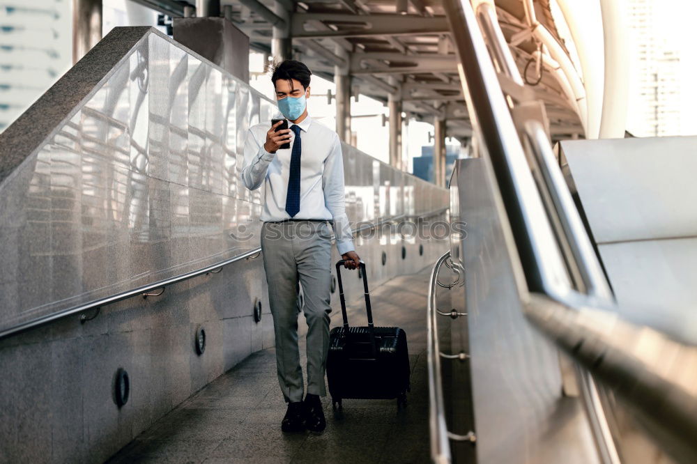 Similar – Image, Stock Photo Businessman in the Train Station.