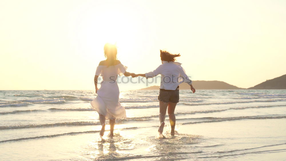 Similar – Father and son playing on the beach at the sunset time. Concept of friendly family.