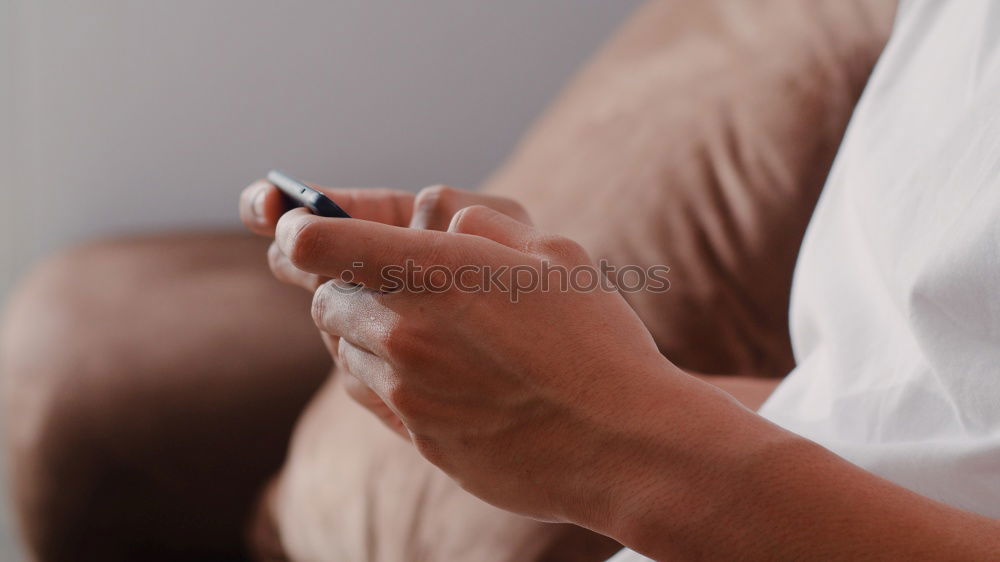 Similar – Close up of hands using smartphone