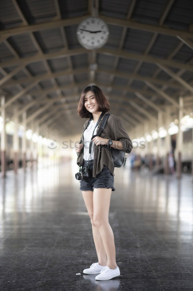 Similar – Image, Stock Photo Young Arab woman tourist waiting her train in a subway station