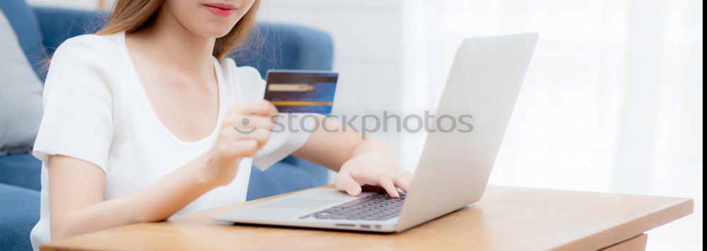 Similar – Image, Stock Photo Side view on woman working on tablet near window in sunlight