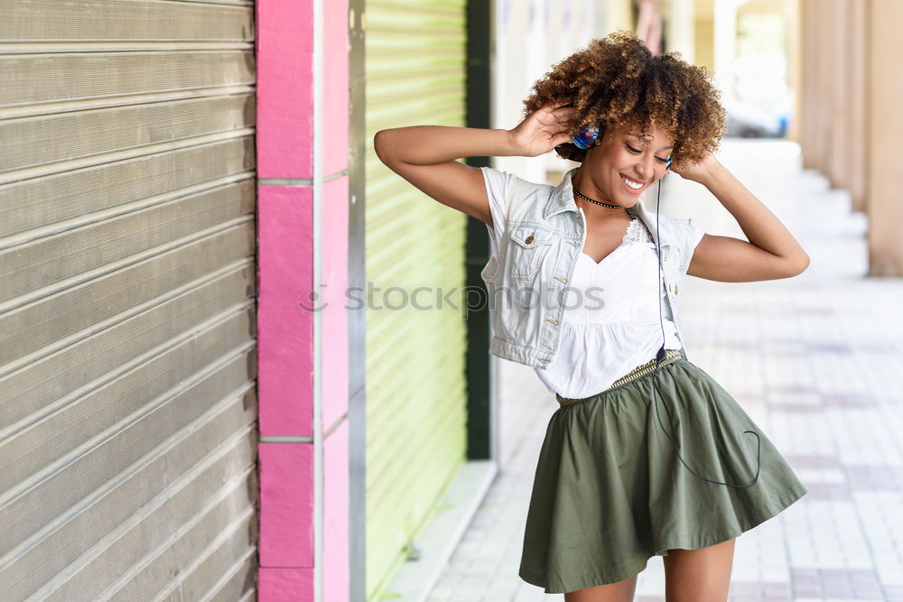 Similar – Image, Stock Photo Young African woman with headphones