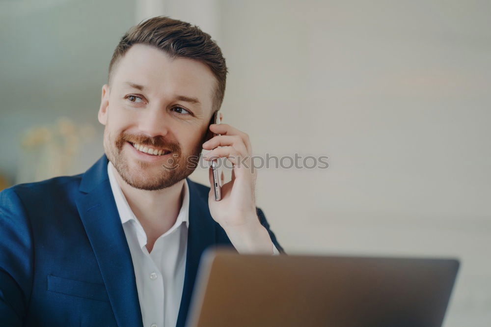 Similar – Image, Stock Photo Handsome businessman with striped tie sits at table with coffee making phone call and using his tablet