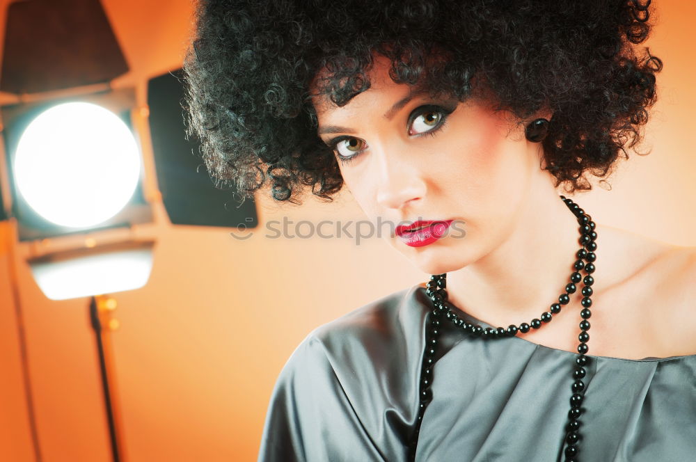 Similar – Curly woman in studio