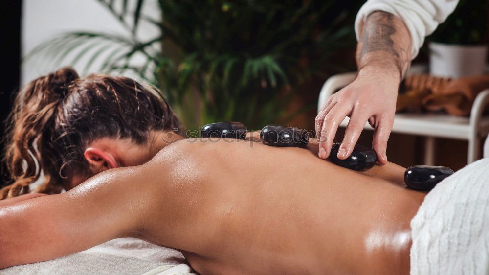 Similar – Image, Stock Photo Man enjoying a back massage