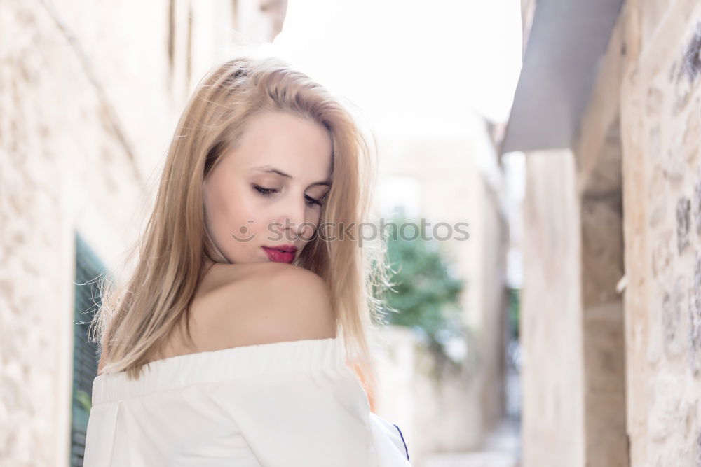 Similar – Image, Stock Photo Young blonde girl wearing casual clothes outdoors