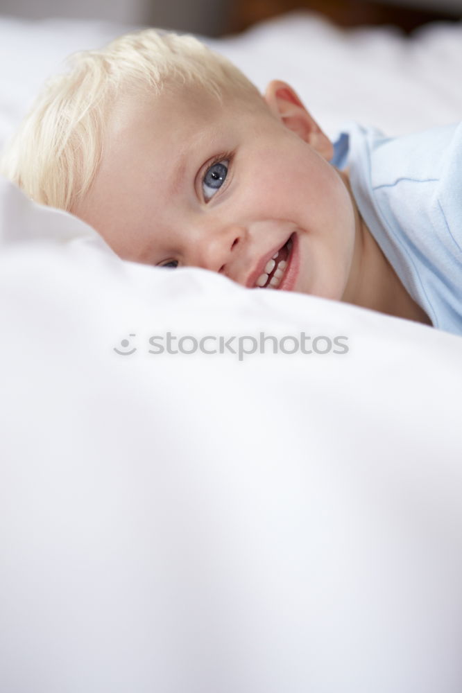 Similar – cute happy toddler girl on bed