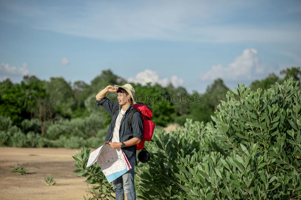 Similar – Image, Stock Photo Rear view, Young woman with hiking rucksack in green forest