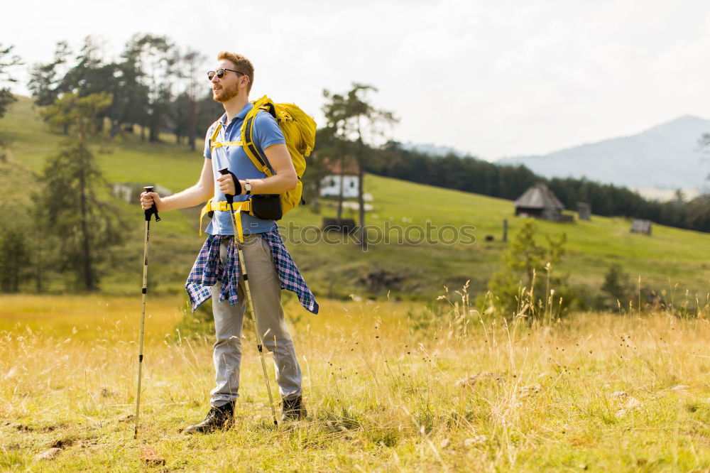 Similar – Foto Bild Frau mit Rucksack und Wanderstöcke