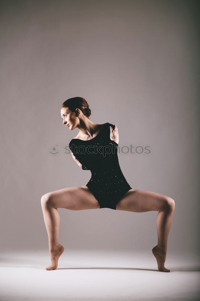 Similar – Ballet dancer posing at street