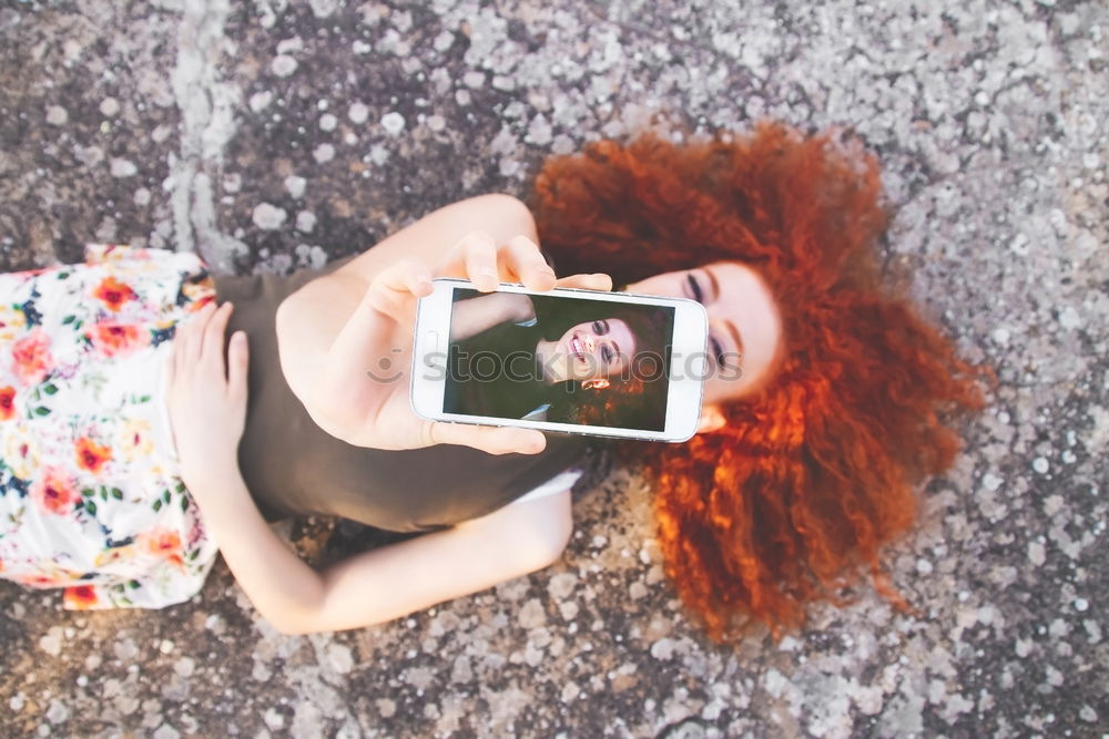 Similar – Young redhead photographer woman