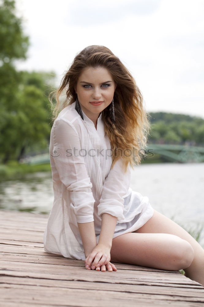 Similar – Image, Stock Photo young woman in summer dress sits among bushes and grass barefoot in nature