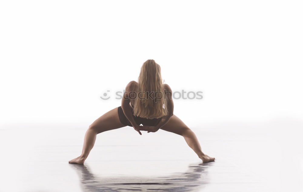 Young woman dancing in studio