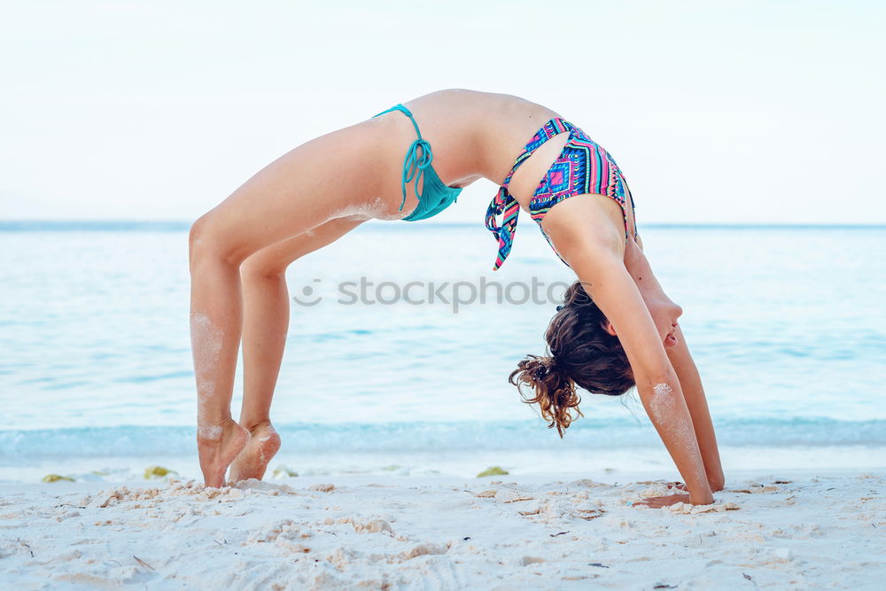 Similar – Image, Stock Photo African American woman doing yoga exercise on beach