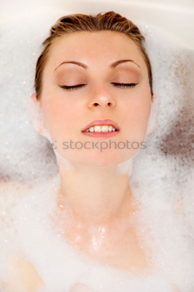 Similar – Image, Stock Photo Woman lying in tub doing hydrotherapy treatment