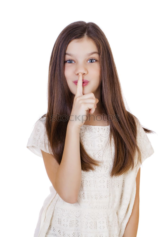 Similar – Young Girl Gesturing Silence.