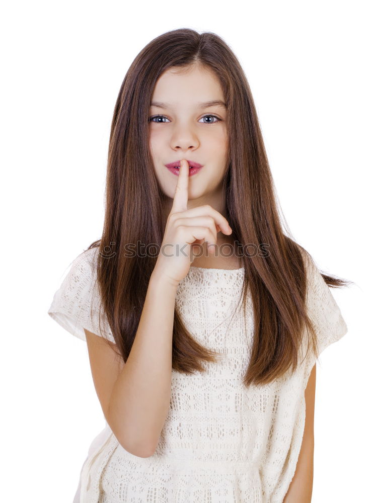 Similar – Young Girl Gesturing Silence.