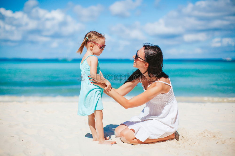 Similar – mother looking with admiration at baby child