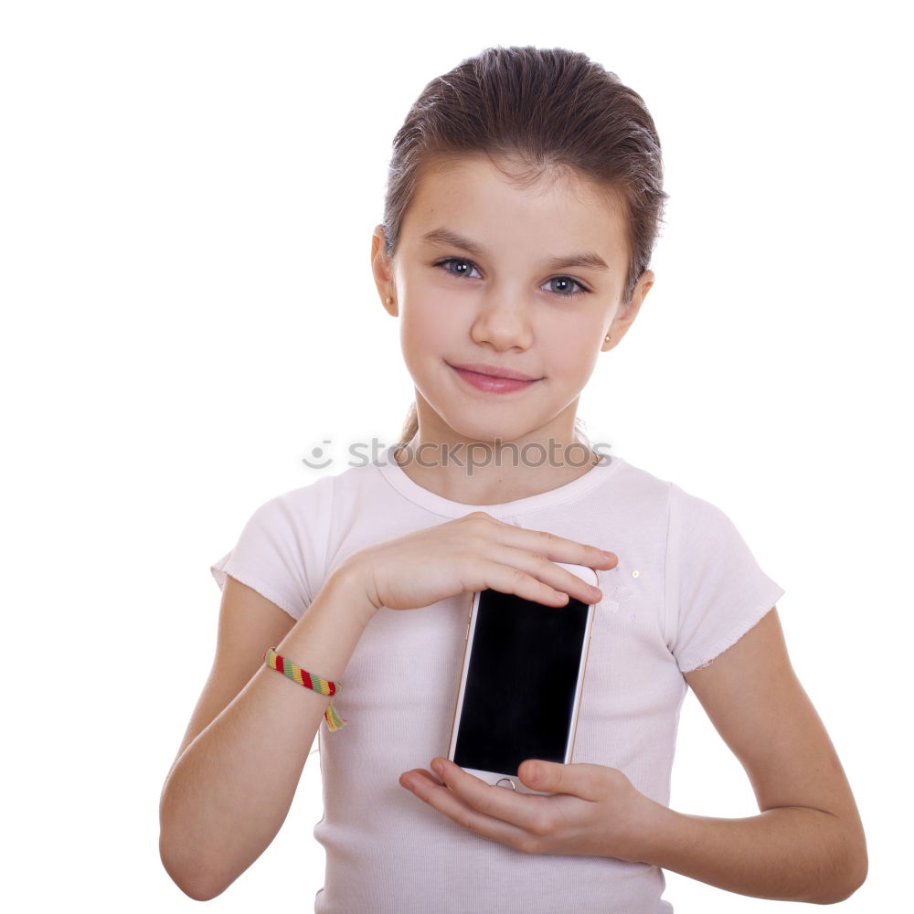 Similar – portrait of a beautiful kid using mobile phone