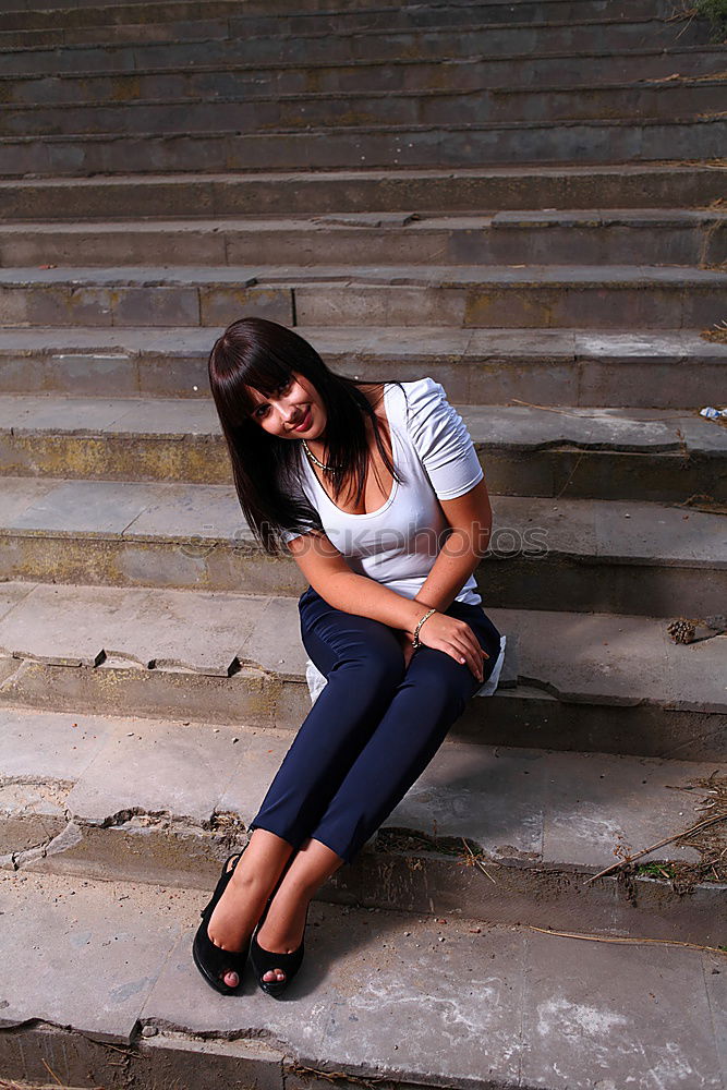 Similar – A young woman sitting on a garden bench