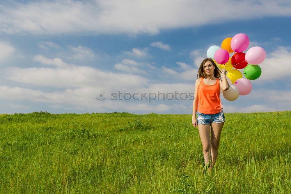 Similar – Image, Stock Photo Woman holding the Gay Rainbow Flag on green meadow outdoor