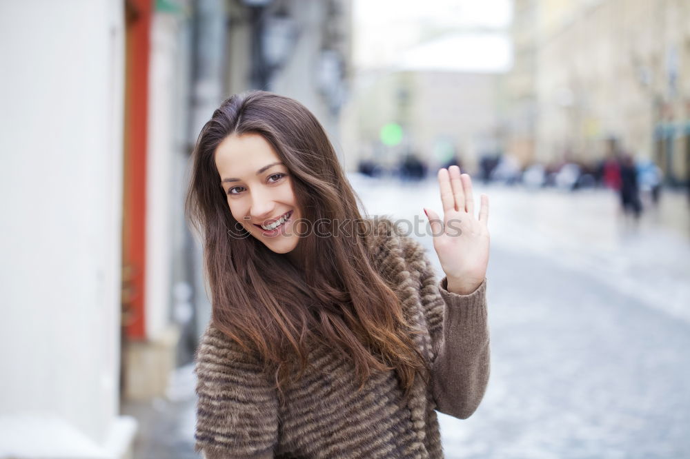 Similar – Young black woman drinking coffee wandering in the streets of Madrid on winter