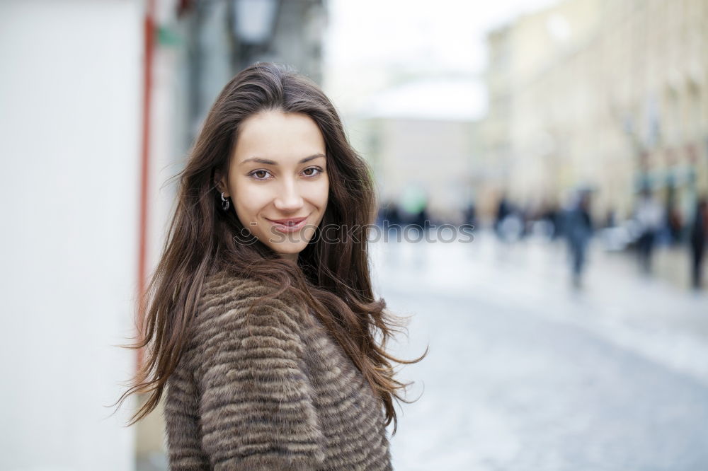 Similar – Image, Stock Photo Brunette woman texting on her mobile phone