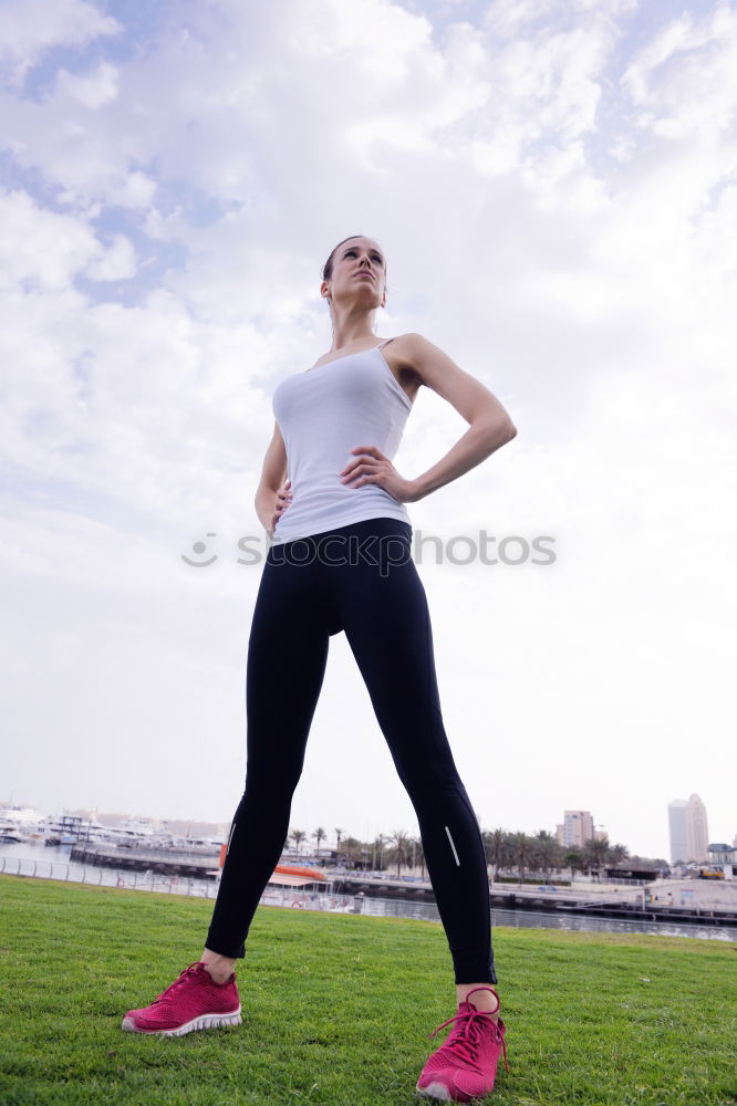 Similar – Young Woman working out outdoors and having fun