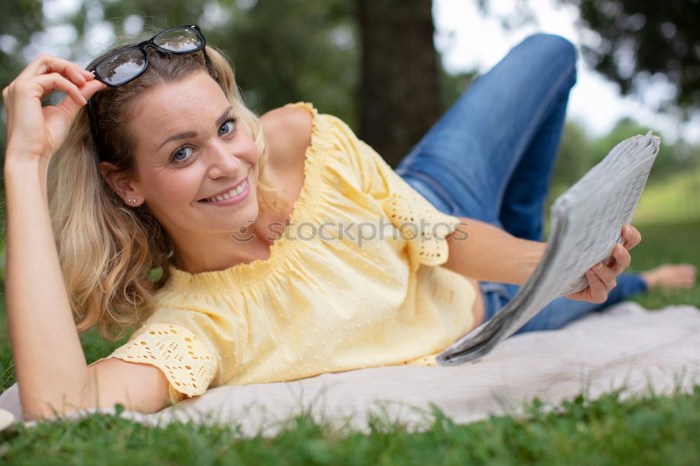 Similar – Beautiful young caucasian woman smiling outdoors