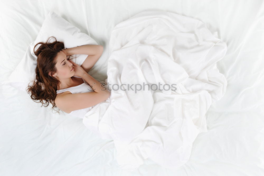 Similar – Image, Stock Photo Attractive, young, sexy, red-haired woman, Redhead, hair wild on the sheets, mouth open, lying in fresh white sheets in bedroom, Hotel bed, copy space.