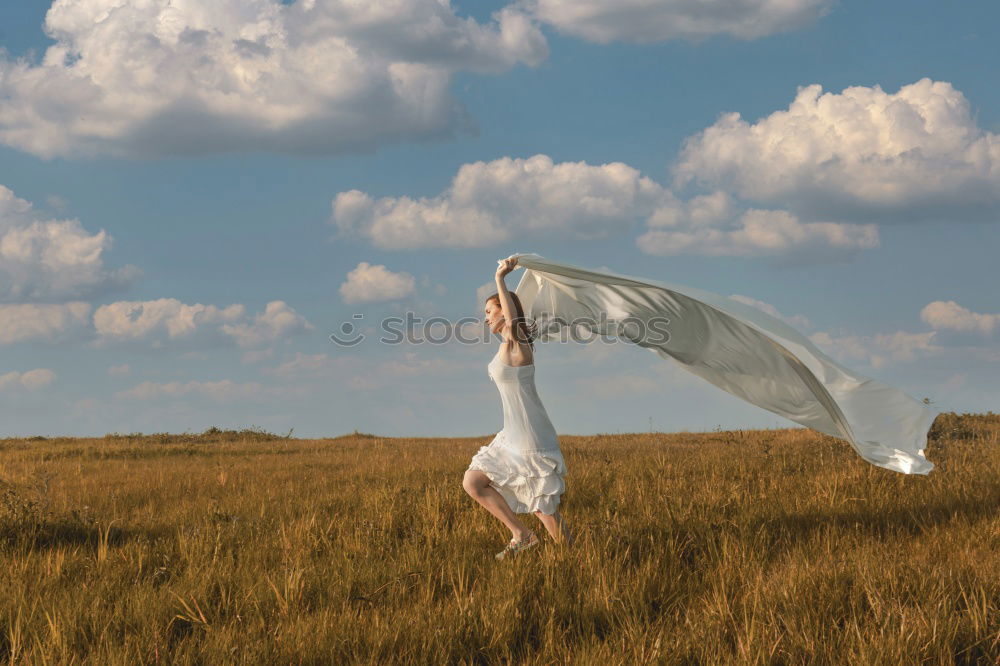 Similar – Image, Stock Photo Girl entangled in plastic on river coast