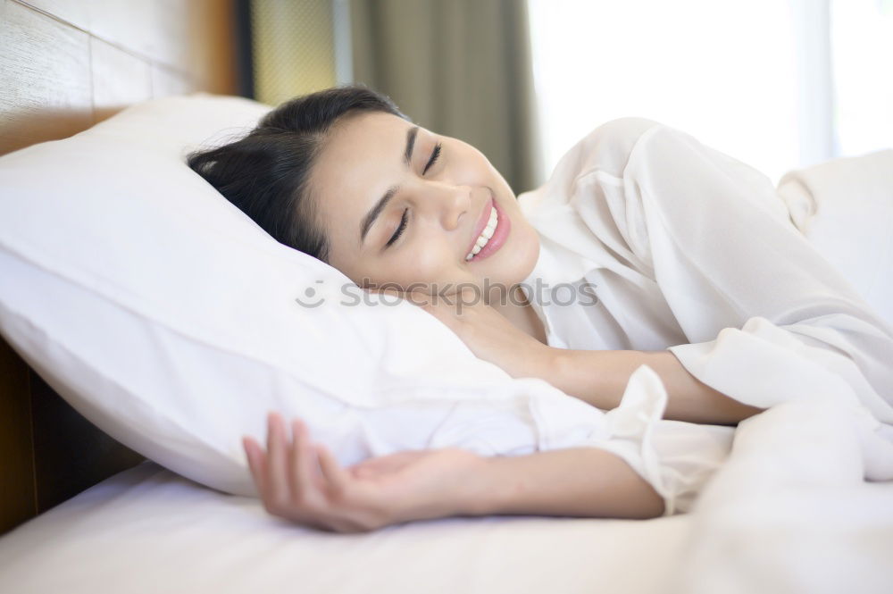 Similar – Image, Stock Photo Young beautiful latin woman lying in bed