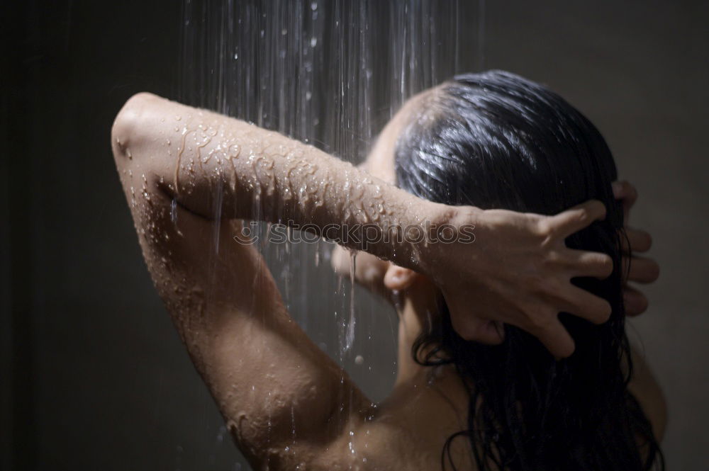 Similar – Woman shampooing her long brown hair