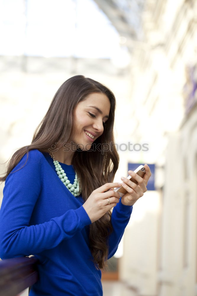 Similar – Image, Stock Photo African woman walking on the street looking at her smart phone